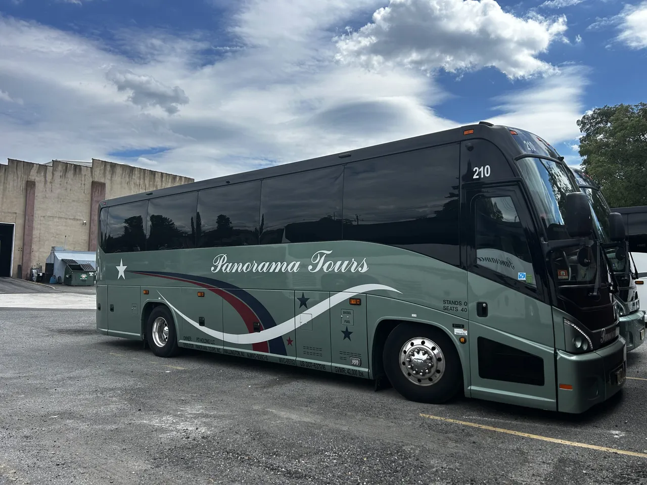 Green 40 Passenger Luxury Coach for charter bus rental
