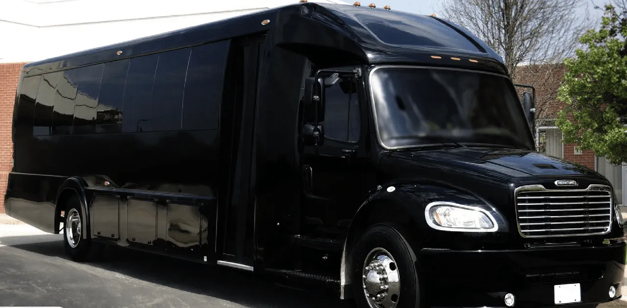 White 55 Passenger Executive Mini Coach for charter bus rental