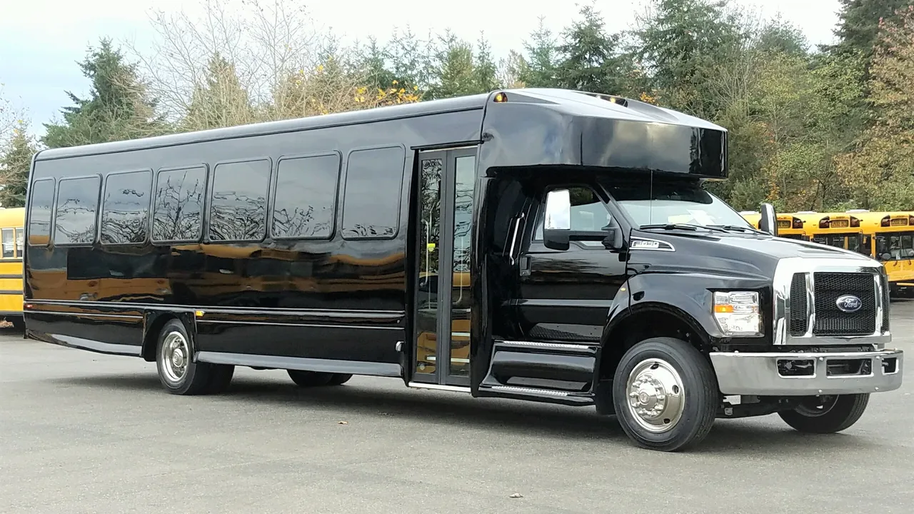 Black Ford F650 Executive VIP Shuttle Bus (44 Passenger), photo 2 for charter bus rental in Hornbrook, CA