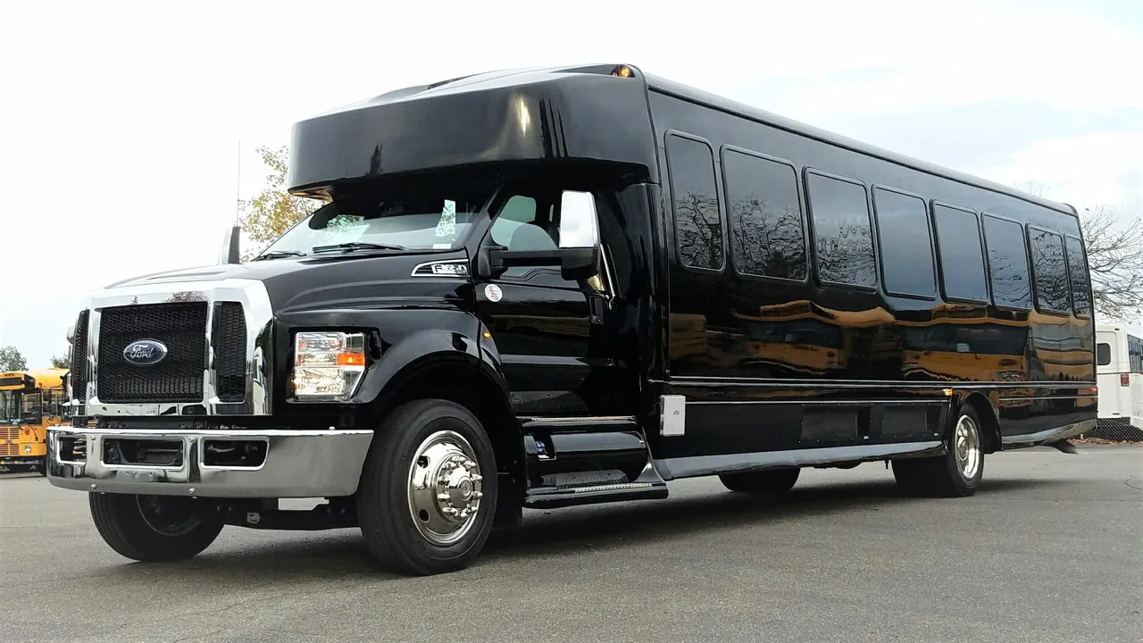 Black Ford F650 Executive VIP Shuttle Bus (44 Passenger), photo 3 for charter bus rental in Hornbrook, CA