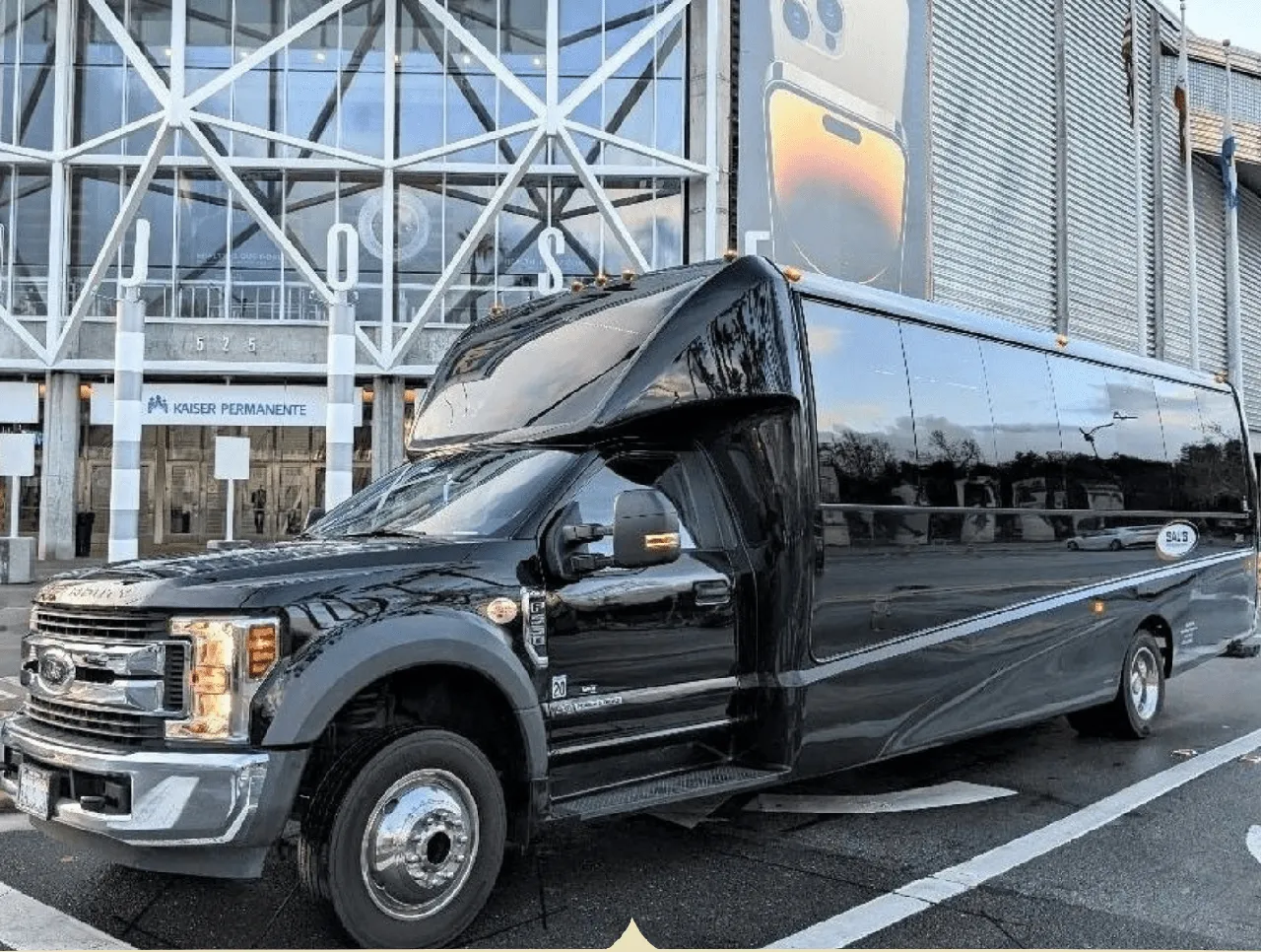 27 Passenger Mini Coach (black) featuring tinted windows