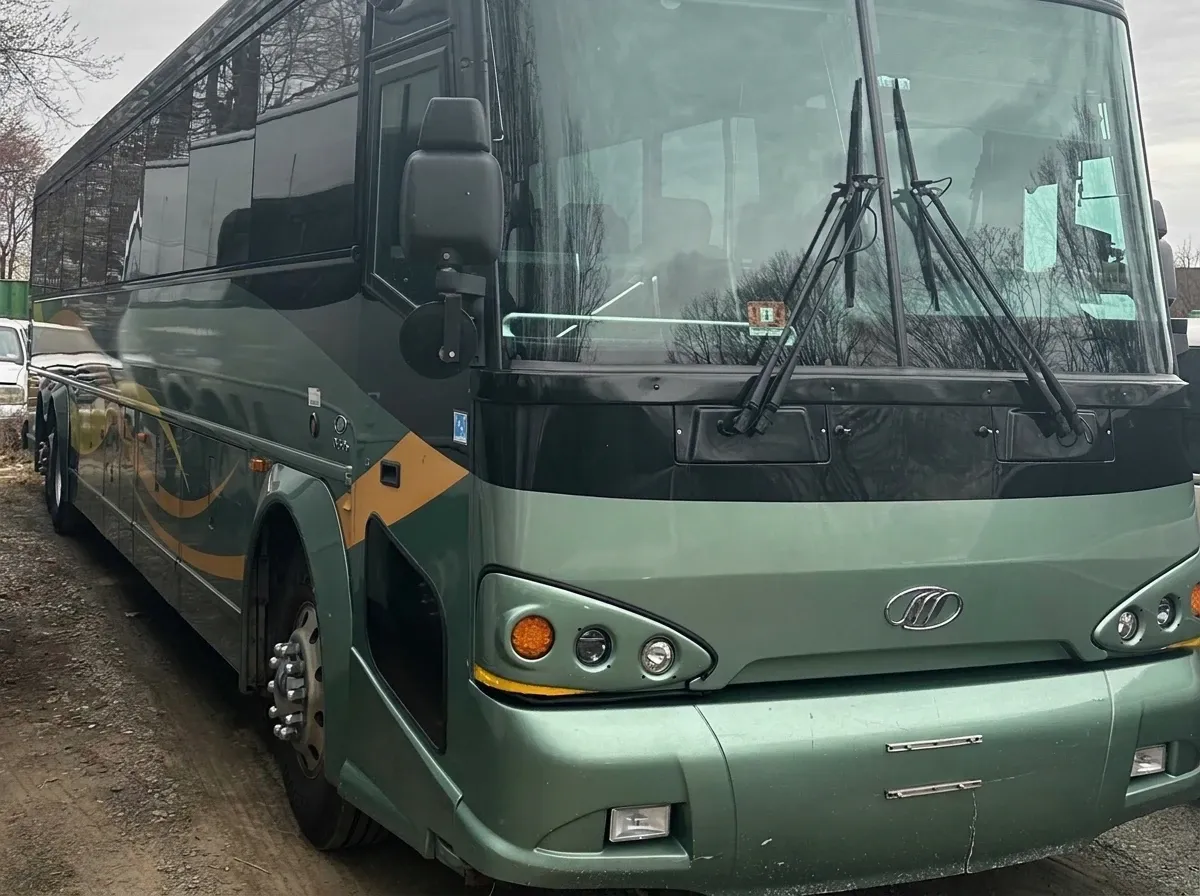 55 Passenger Motor Coach (green) – yours to rent
