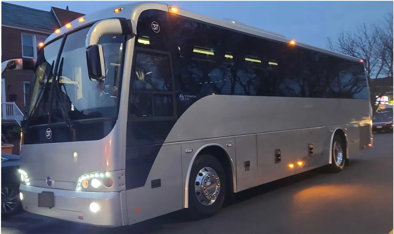 55 Passenger Motor Coach (black) – yours to rent