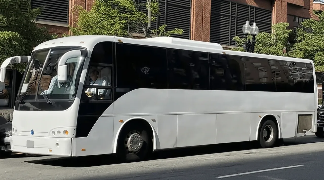 40 Passenger Motor Coach (white) – yours to rent