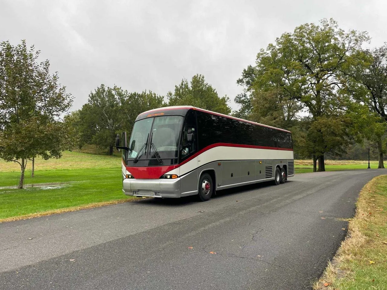 Black 52 Passenger Motor Coach for charter bus rental