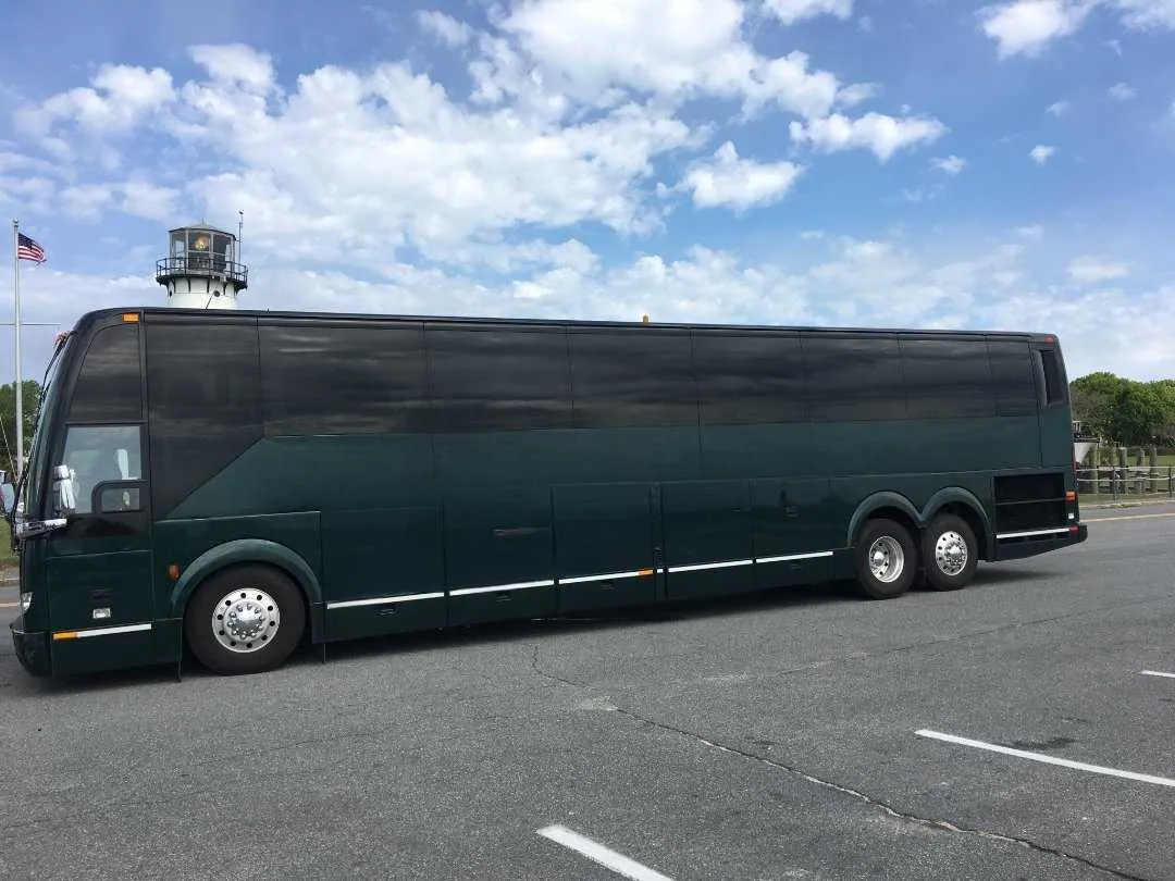 56 Passenger Motor Coach with tinted windows for charter bus rental